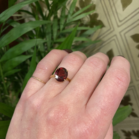 Vintage Oval Garnet in Gold Solitaire
