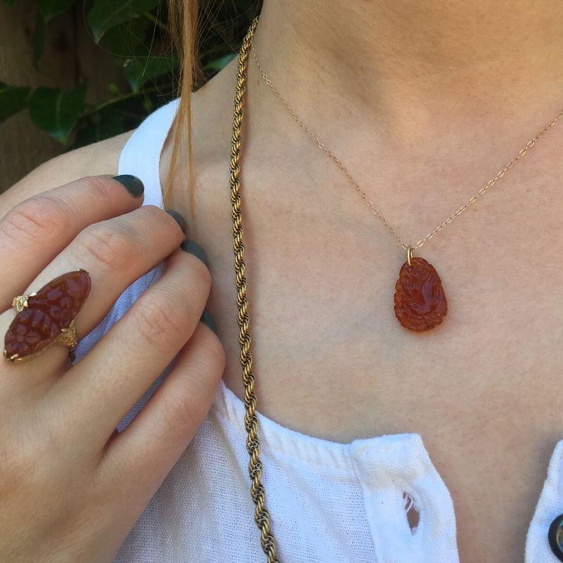 Hand Carved Golden Amber Bird Pendant