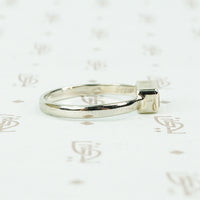 14k recycled white gold and imperial topaz ring side view