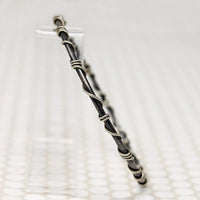 The Infinity Twist Silver Bangle from Allie B.
