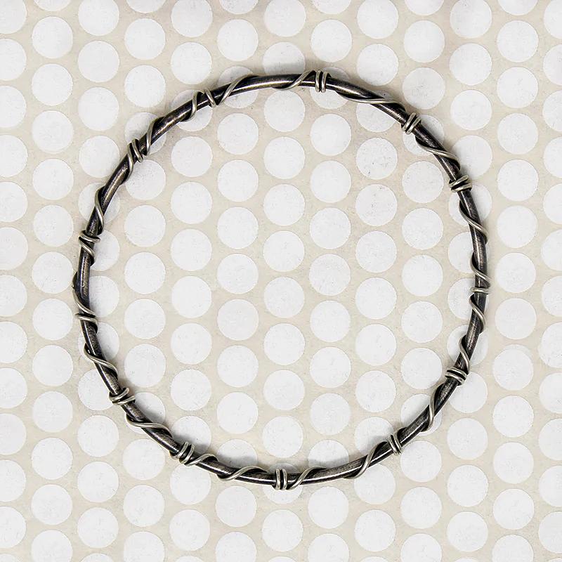 The Infinity Twist Silver Bangle from Allie B.