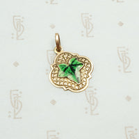 realistically enameled ivy leaf on an embellished 14k rose gold pendant