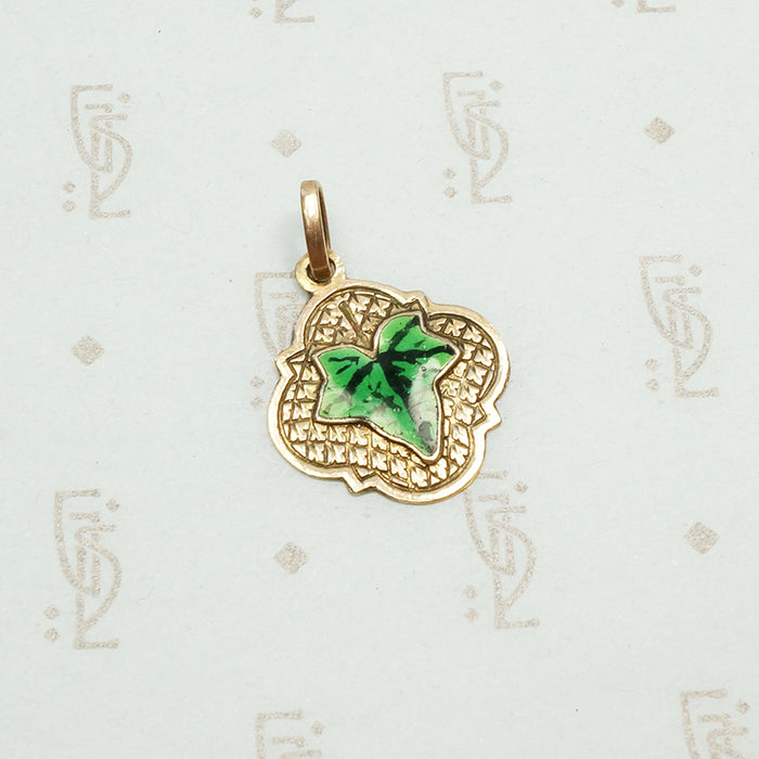 realistically enameled ivy leaf on an embellished 14k rose gold pendant