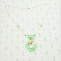 Beautifully Carved Jade Necklace in Gold