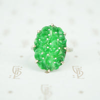 bright green carved jade set in 10k white gold ring