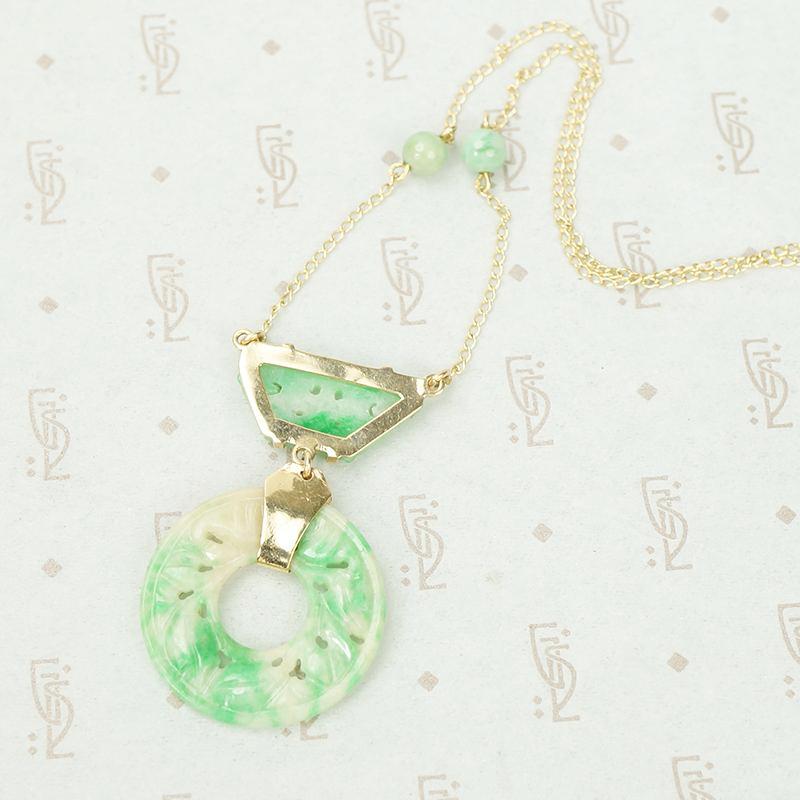 Beautifully Carved Jade Necklace in Gold