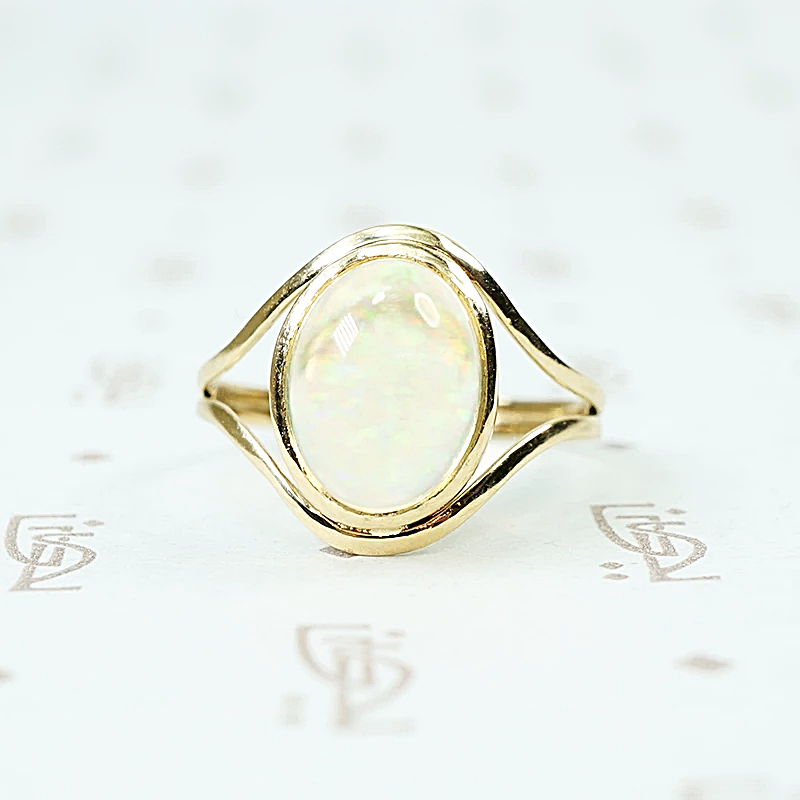 Jelly Opal set in 14k recycled yellow gold ring