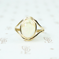 Jelly Opal set in 14k recycled yellow gold ring