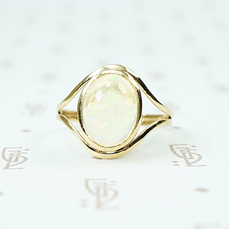 Jelly Opal set in 14k recycled yellow gold ring
