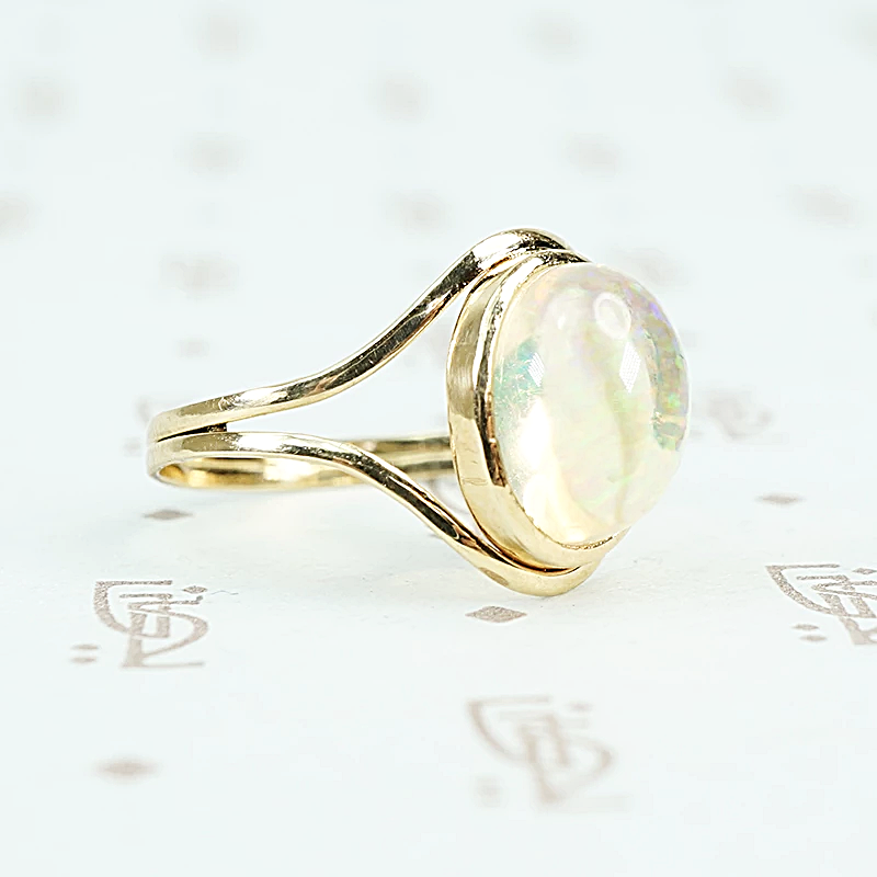 Jelly Opal set in 14k recycled yellow gold ring side view