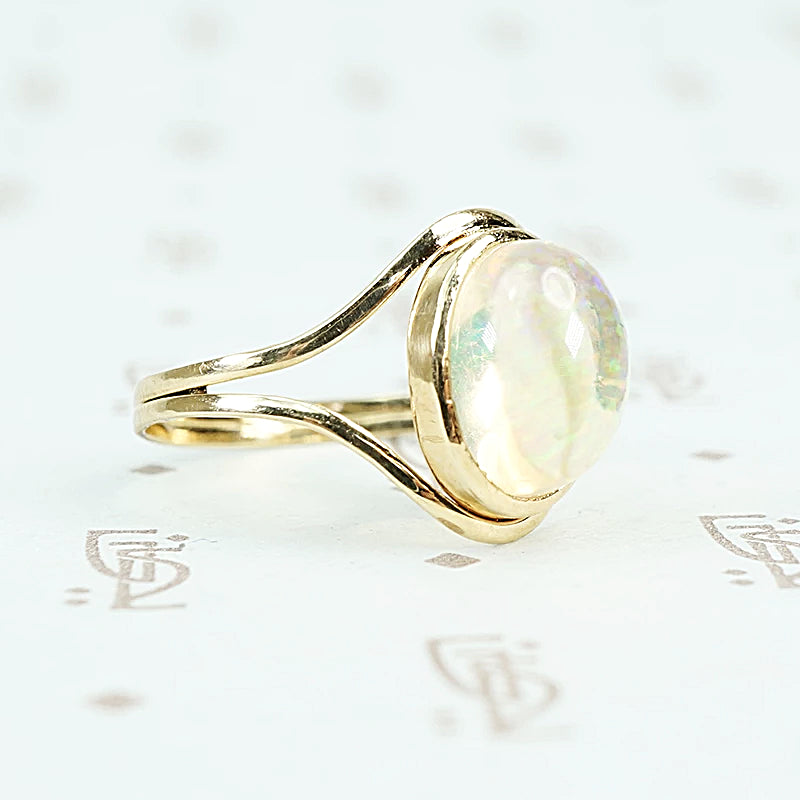 Jelly Opal set in 14k recycled yellow gold ring side view