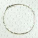 Short Woven Silver Chain with Decorative Clasp