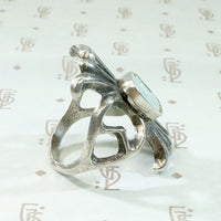 Navajo Sand Cast Silver Ring with Pale Green Turquoise