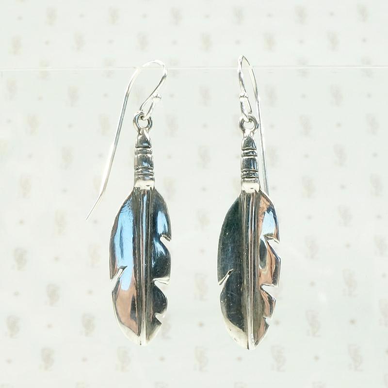 Silver Feather Earrings with Rock & Roll Vibes