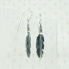 Silver Feather Earrings with Rock & Roll Vibes