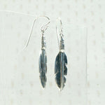 Silver Feather Earrings with Rock & Roll Vibes