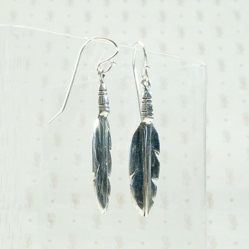 Silver Feather Earrings with Rock & Roll Vibes