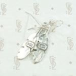 Silver Feather Earrings with Rock & Roll Vibes