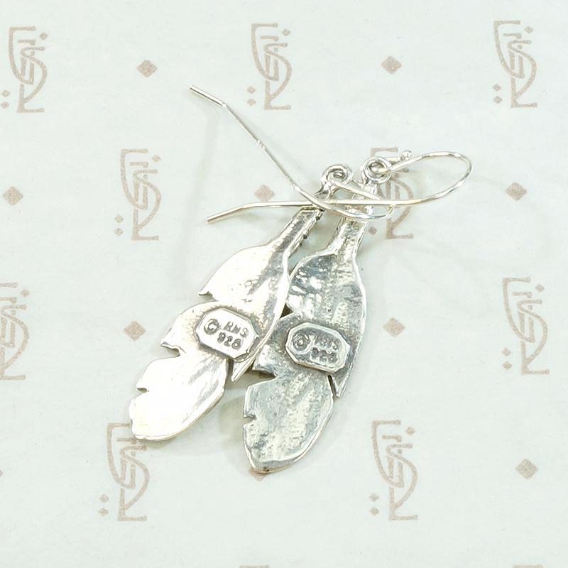 Silver Feather Earrings with Rock & Roll Vibes
