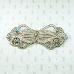 Matched Pair of Ornate Silver Filigree Brooches