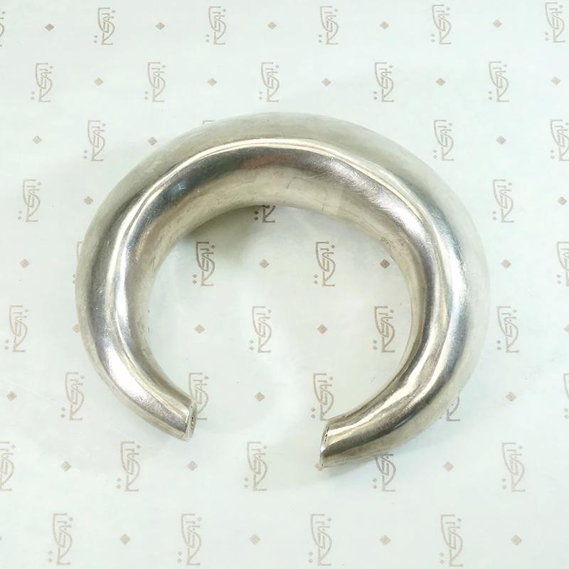 Chunky Silver Cuff with a Rattle