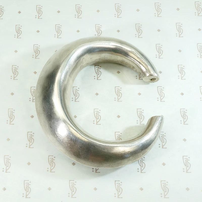 Chunky Silver Cuff with a Rattle