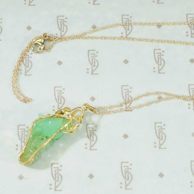 Rich Green Carved Jade Pendant
