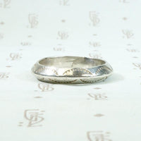 Potent Rattlesnake Jaw Coin Silver Band