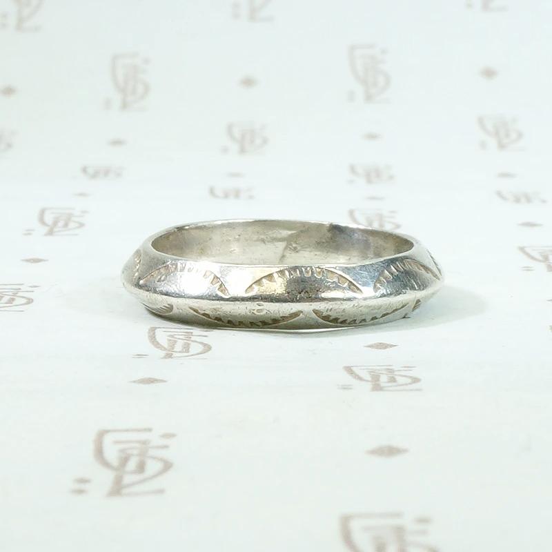 Potent Rattlesnake Jaw Coin Silver Band