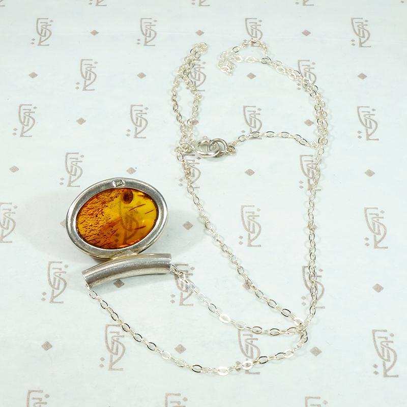 Sleek Modernist Amber & Sterling Pendant