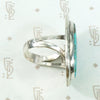 Serene Turquoise Ring with Rattlesnake Jaw Rockers