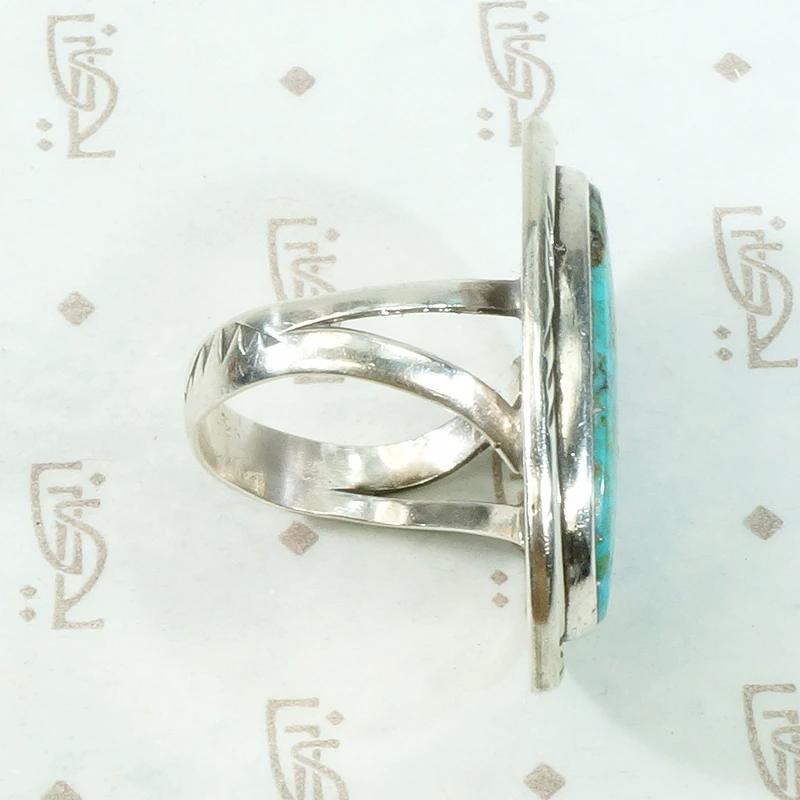 Serene Turquoise Ring with Rattlesnake Jaw Rockers