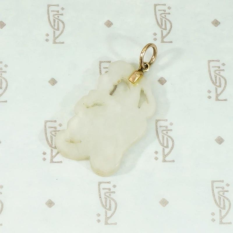 Fanciful Carved Jade Fan Pendant