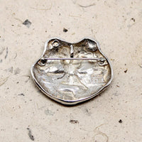 She Who Watches Brooch by Lillian Pitt