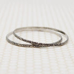 Pair of Slim Engraved Silver Bangles