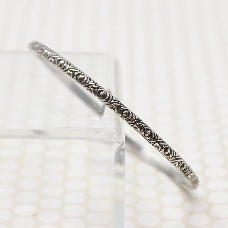 Pair of Slim Engraved Silver Bangles