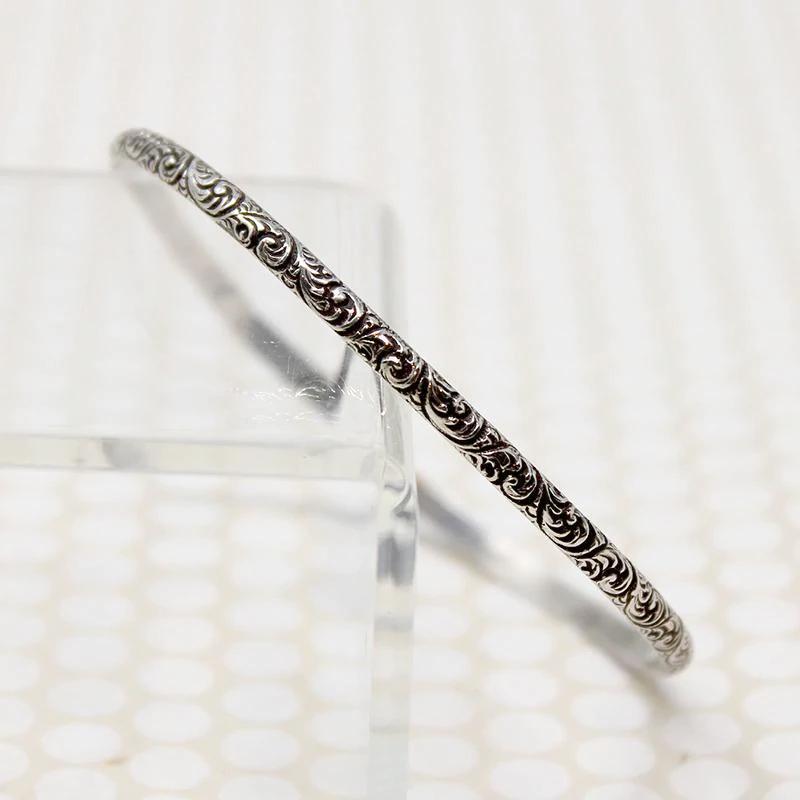 Pair of Slim Engraved Silver Bangles
