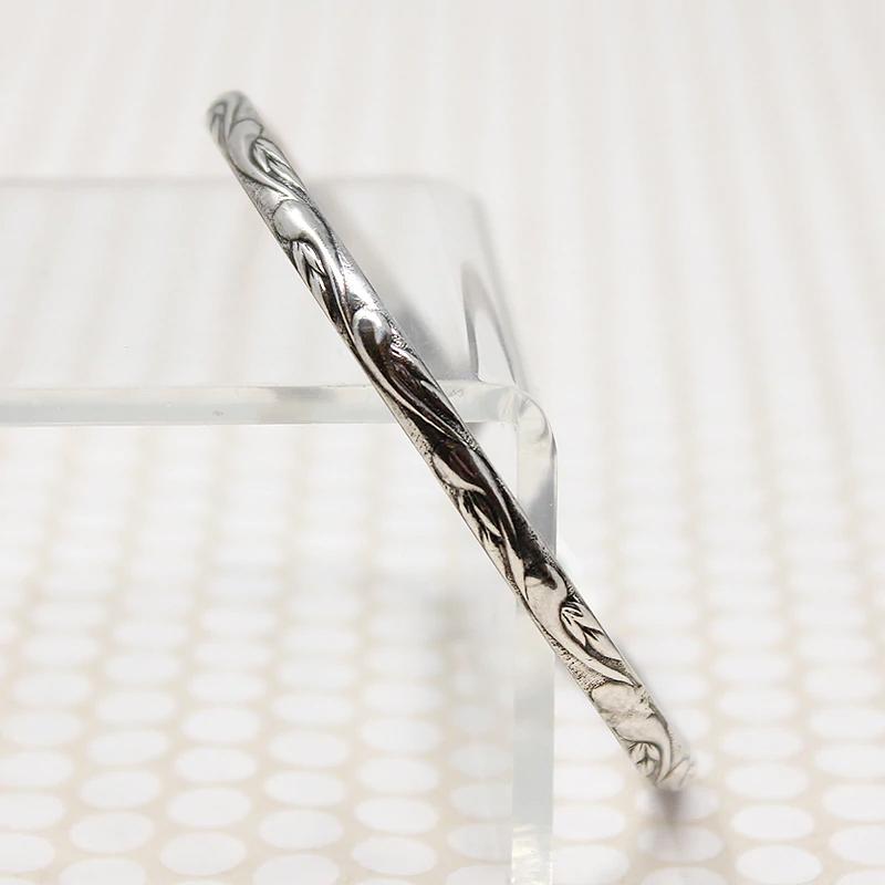 Swirling Silver Mid Century Danecraft Bangle
