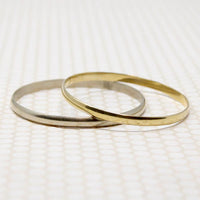 Pair of Two Tone Plated Bangle Bracelets