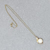 Blushing Mabé Pearl & Ruby Pendant in Gold