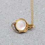 Blushing Mabé Pearl & Ruby Pendant in Gold