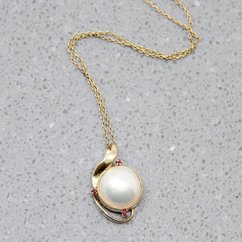 Blushing Mabé Pearl & Ruby Pendant in Gold