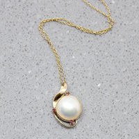 Blushing Mabé Pearl & Ruby Pendant in Gold