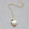 Blushing Mabé Pearl & Ruby Pendant in Gold