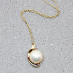 Blushing Mabé Pearl & Ruby Pendant in Gold
