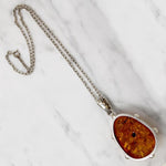 Baltic Amber in Brutal Bossed Silver Necklace