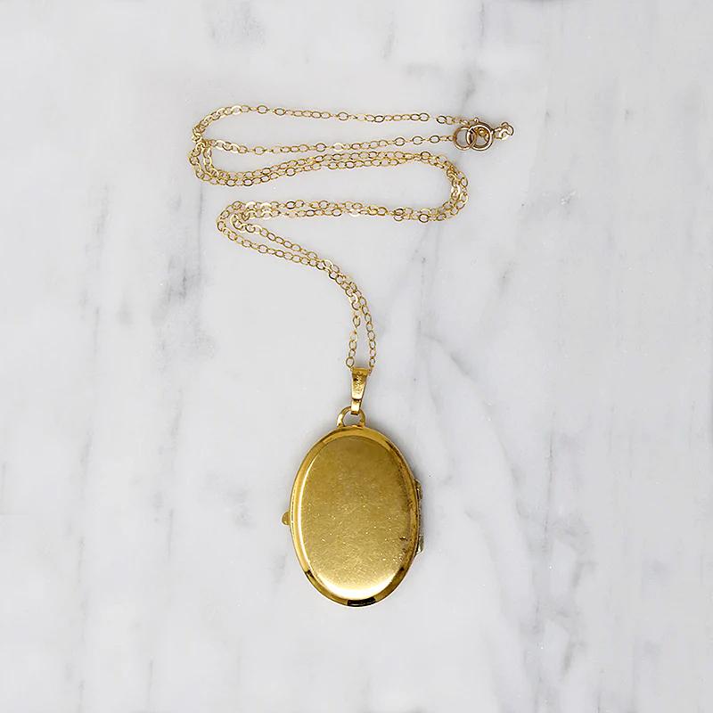 Golden Vintage Oval Locket by Monet