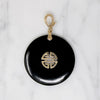 Inky Black Onyx Pendant with Gold Details