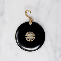Inky Black Onyx Pendant with Gold Details