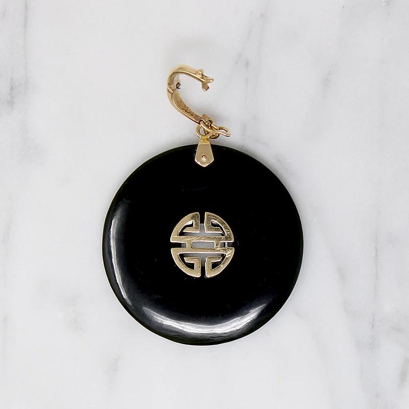 Inky Black Onyx Pendant with Gold Details